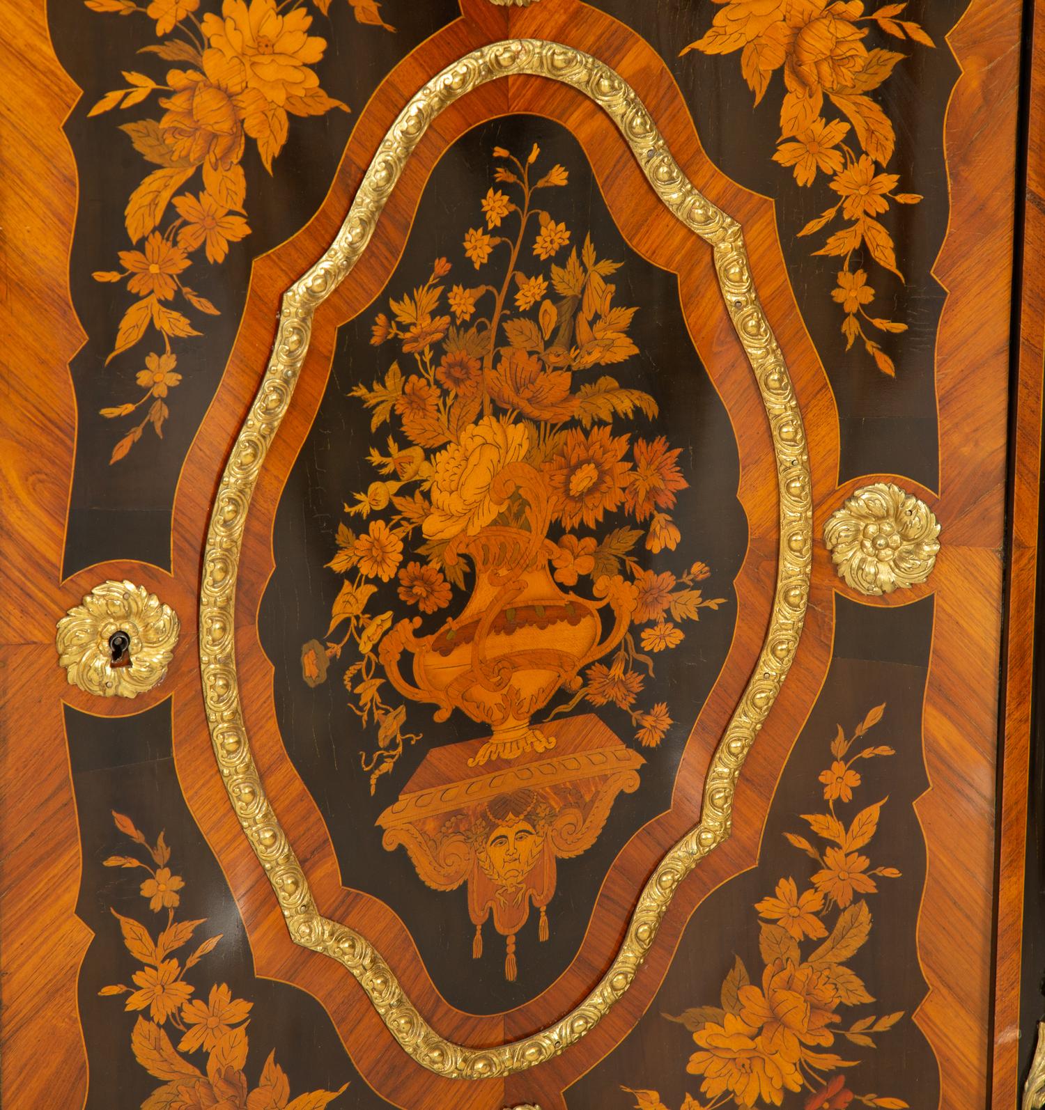 A Napoleon III Gilt Bronze Mounted Marquetry Marble-Top Serpentine Cabinet