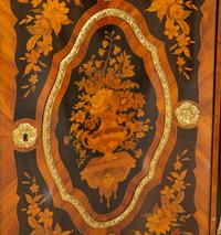 A Napoleon III Gilt Bronze Mounted Marquetry Marble-Top Serpentine Cabinet