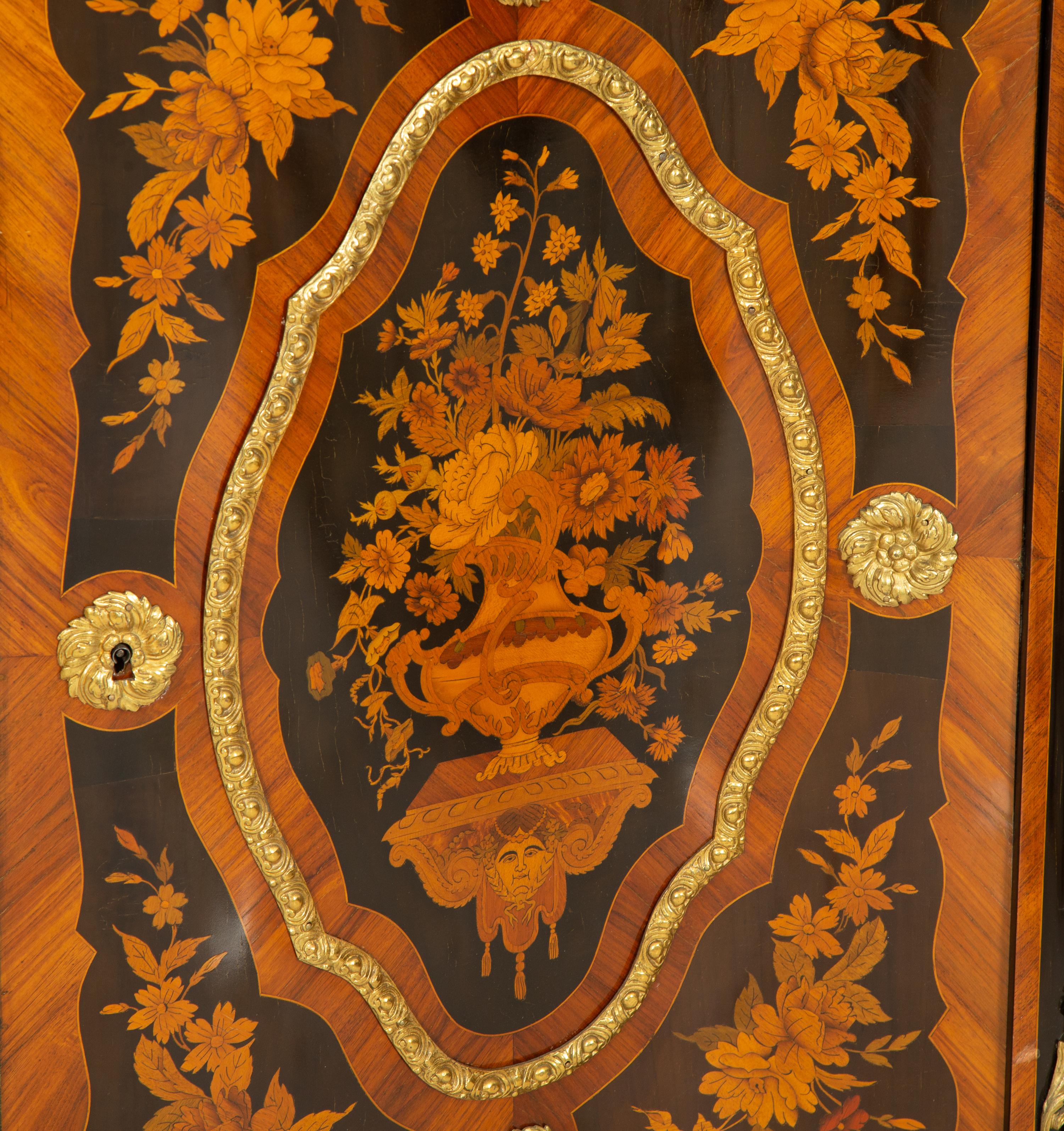 A Napoleon III Gilt Bronze Mounted Marquetry Marble-Top Serpentine Cabinet