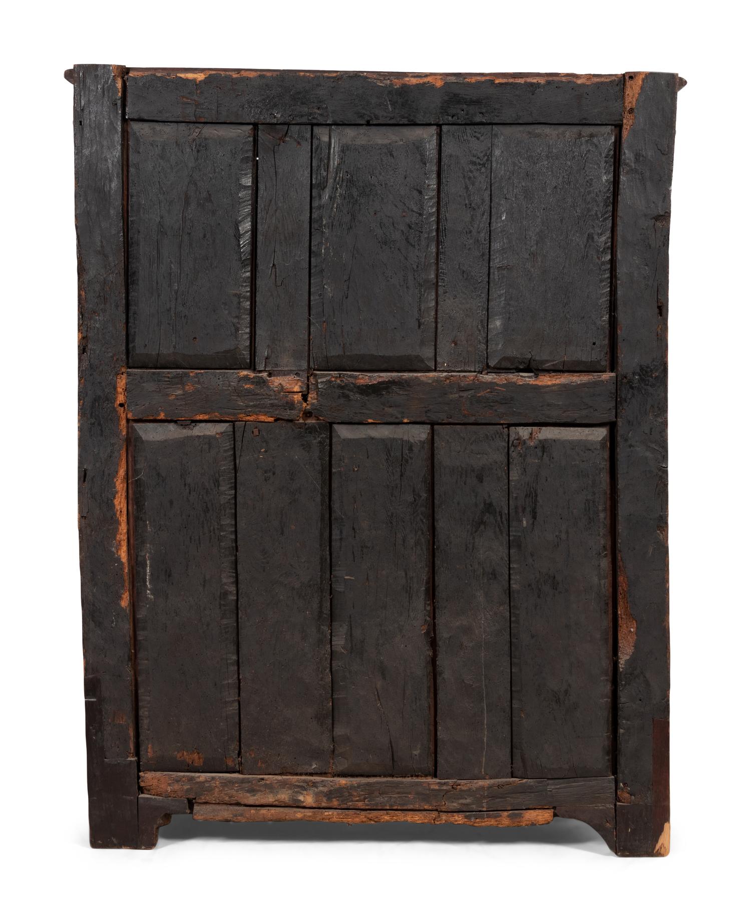 A Spanish Carved Walnut Cabinet