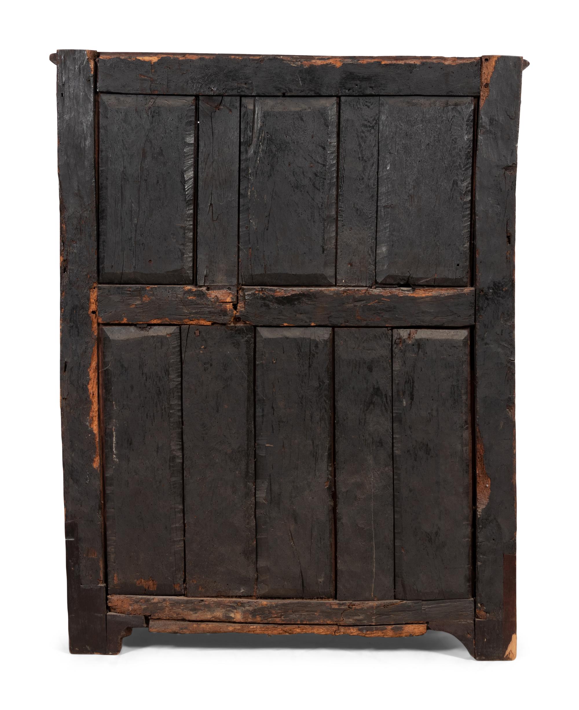 A Spanish Carved Walnut Cabinet
