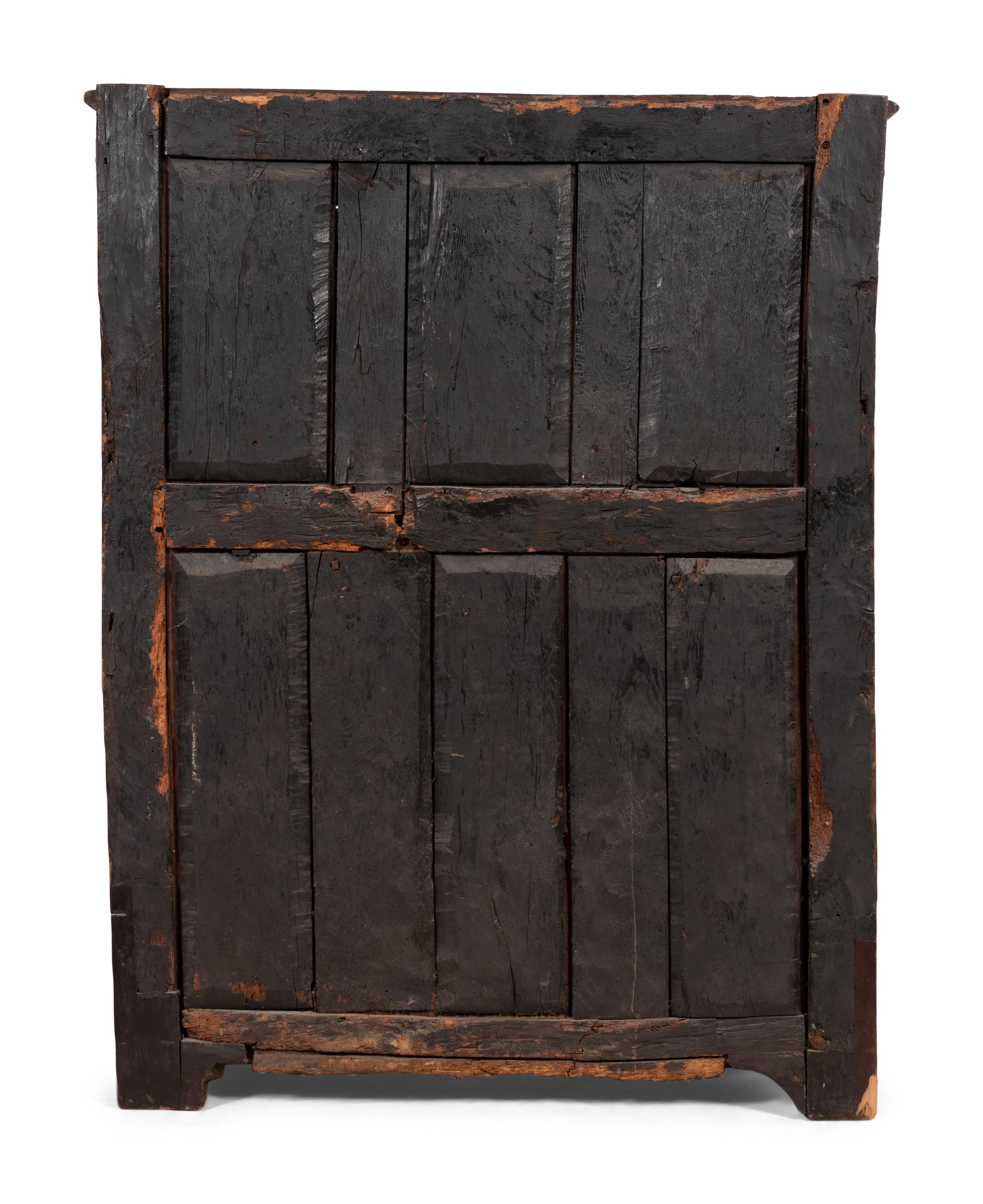 A Spanish Carved Walnut Cabinet