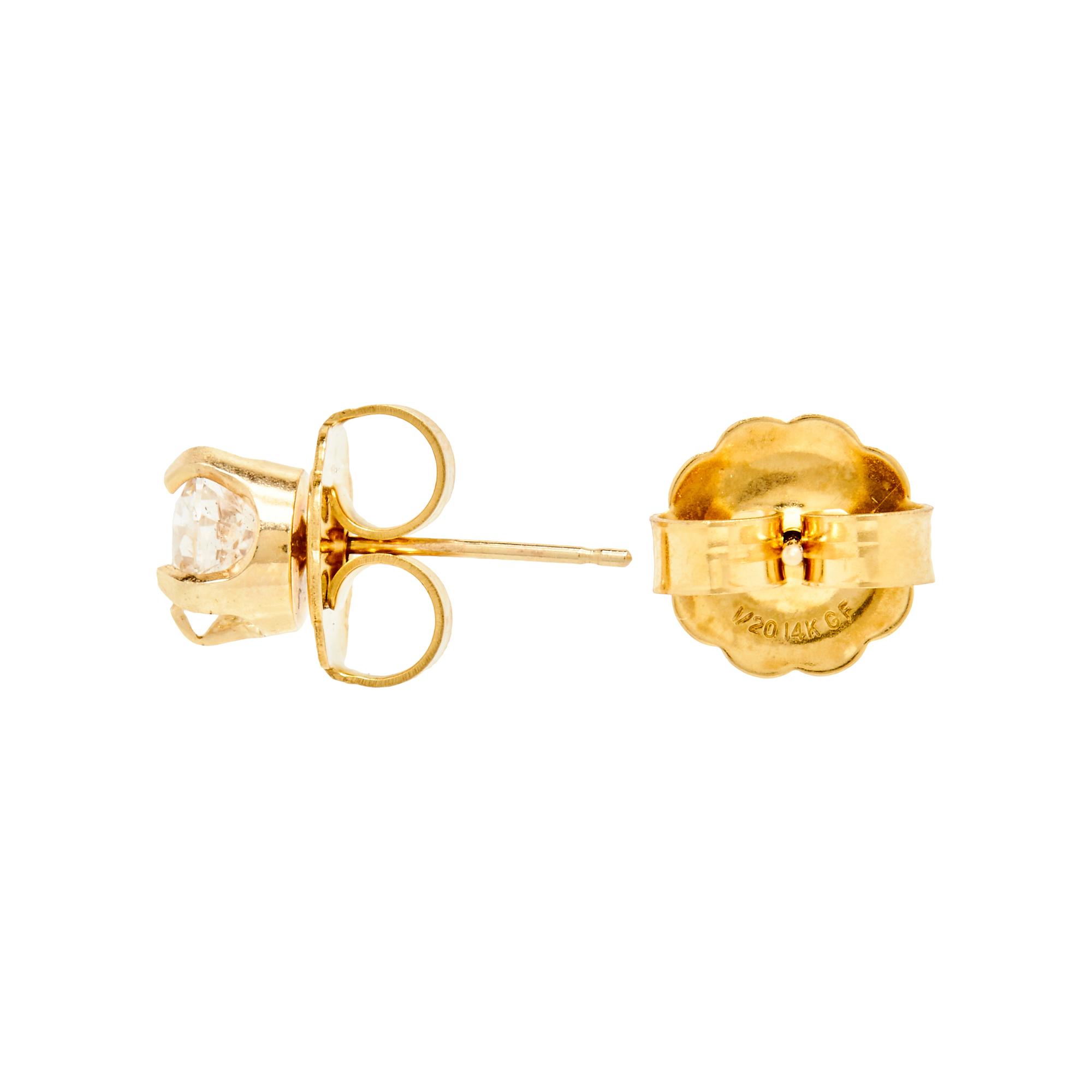 COLLECTION OF YELLOW GOLD AND DIAMOND STUD EARRINGS