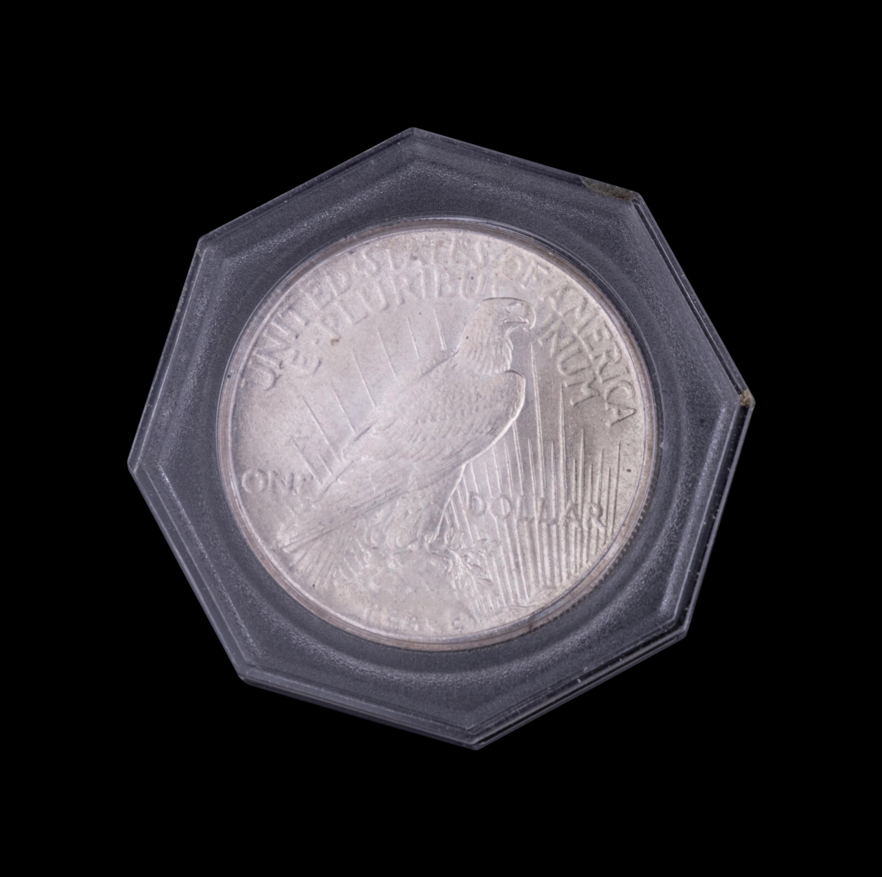 Seven 1925 Peace $1 Coins