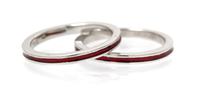 A Pair of 18 Karat White Gold and Red Enamel Rings, Hidalgo. 3.30 dwts.