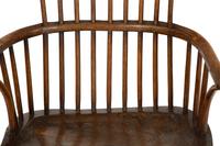 A George III Oak Comb-Back Windsor Armchair