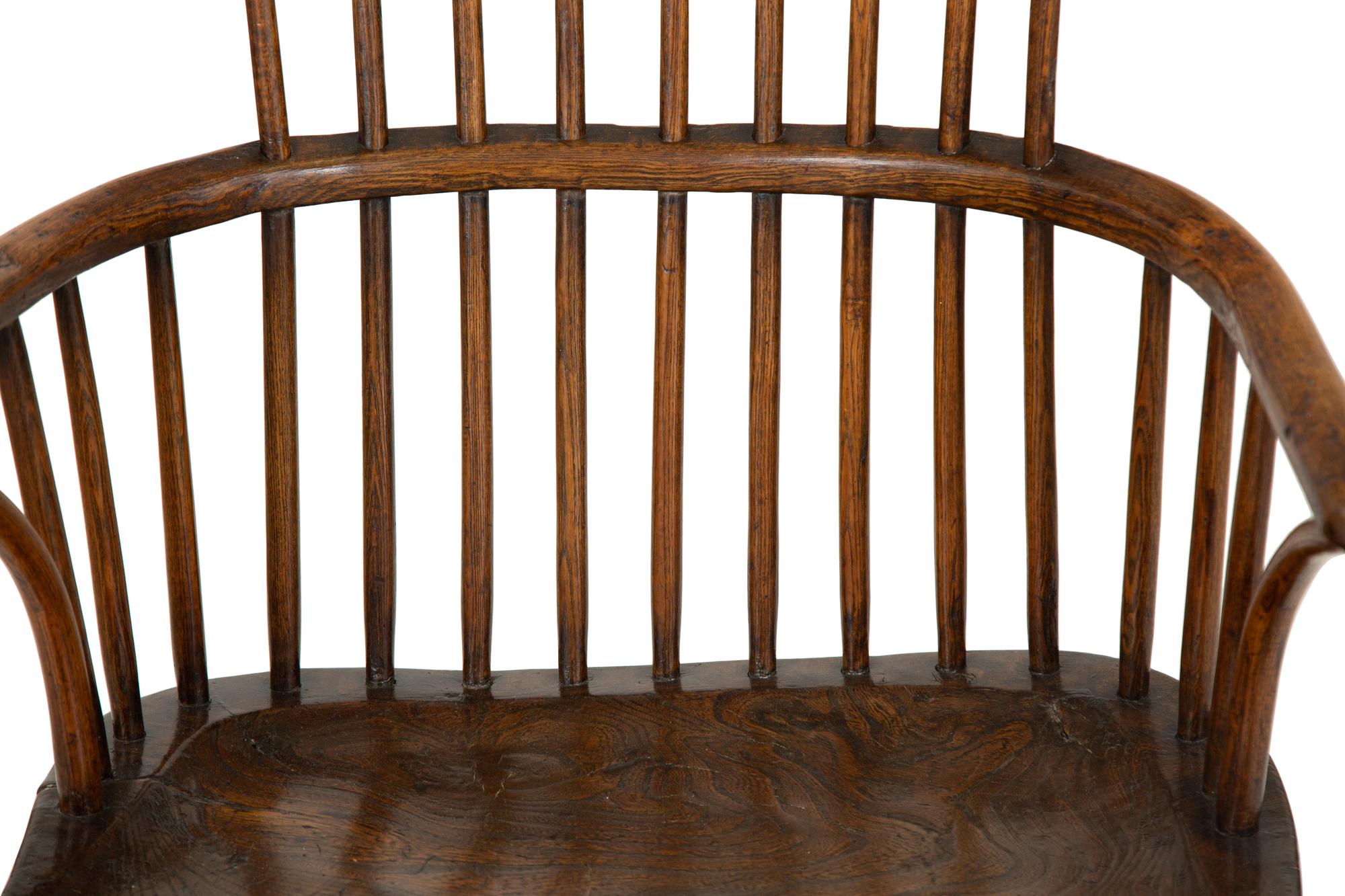 A George III Oak Comb-Back Windsor Armchair