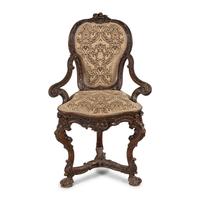 A Venetian Carved Walnut Armchair