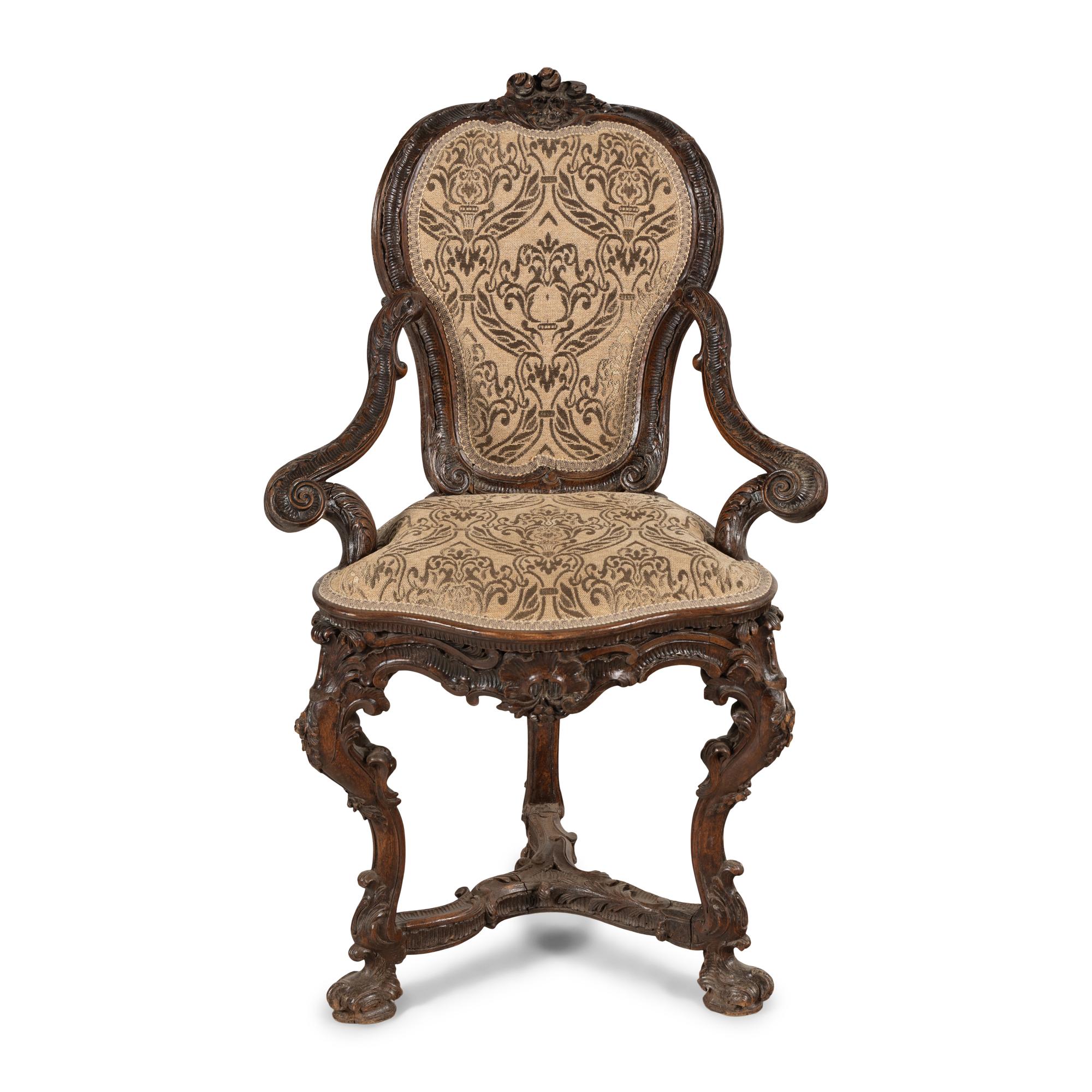 A Venetian Carved Walnut Armchair