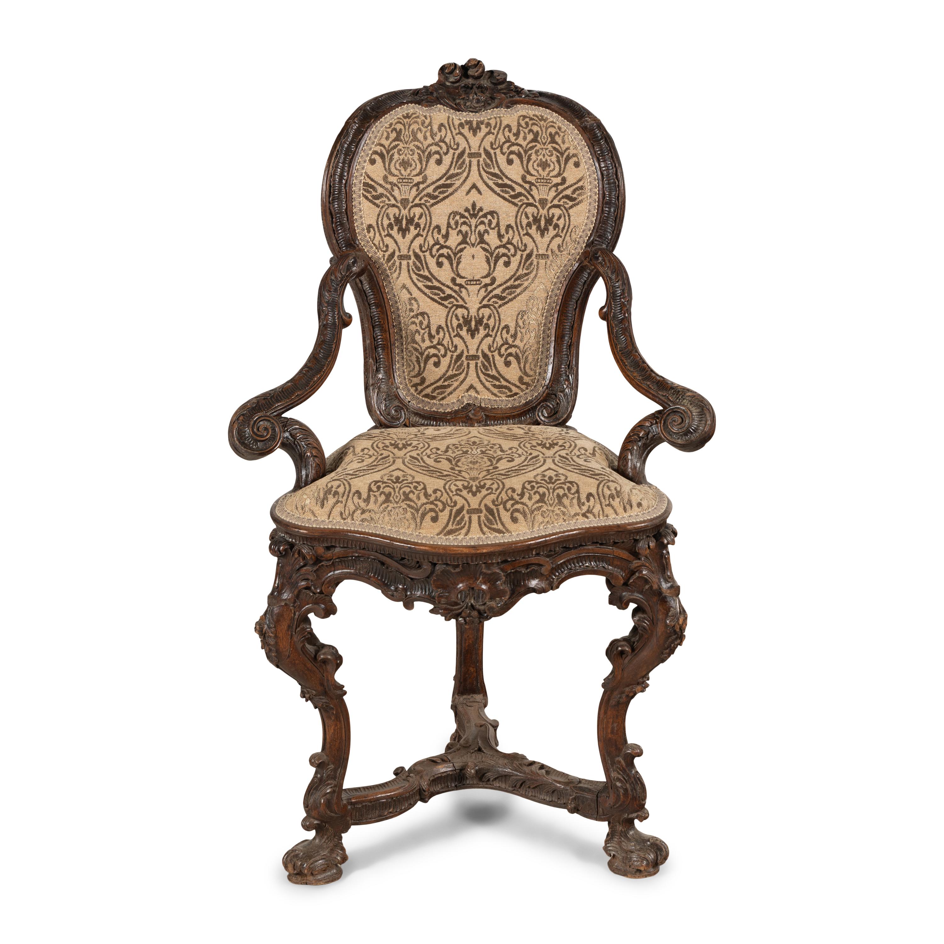 A Venetian Carved Walnut Armchair