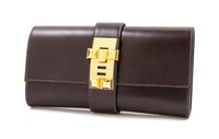 An Hermes 23cm Brown Box Calf Medor Clutch, 9" x 4.5" x 1.5".