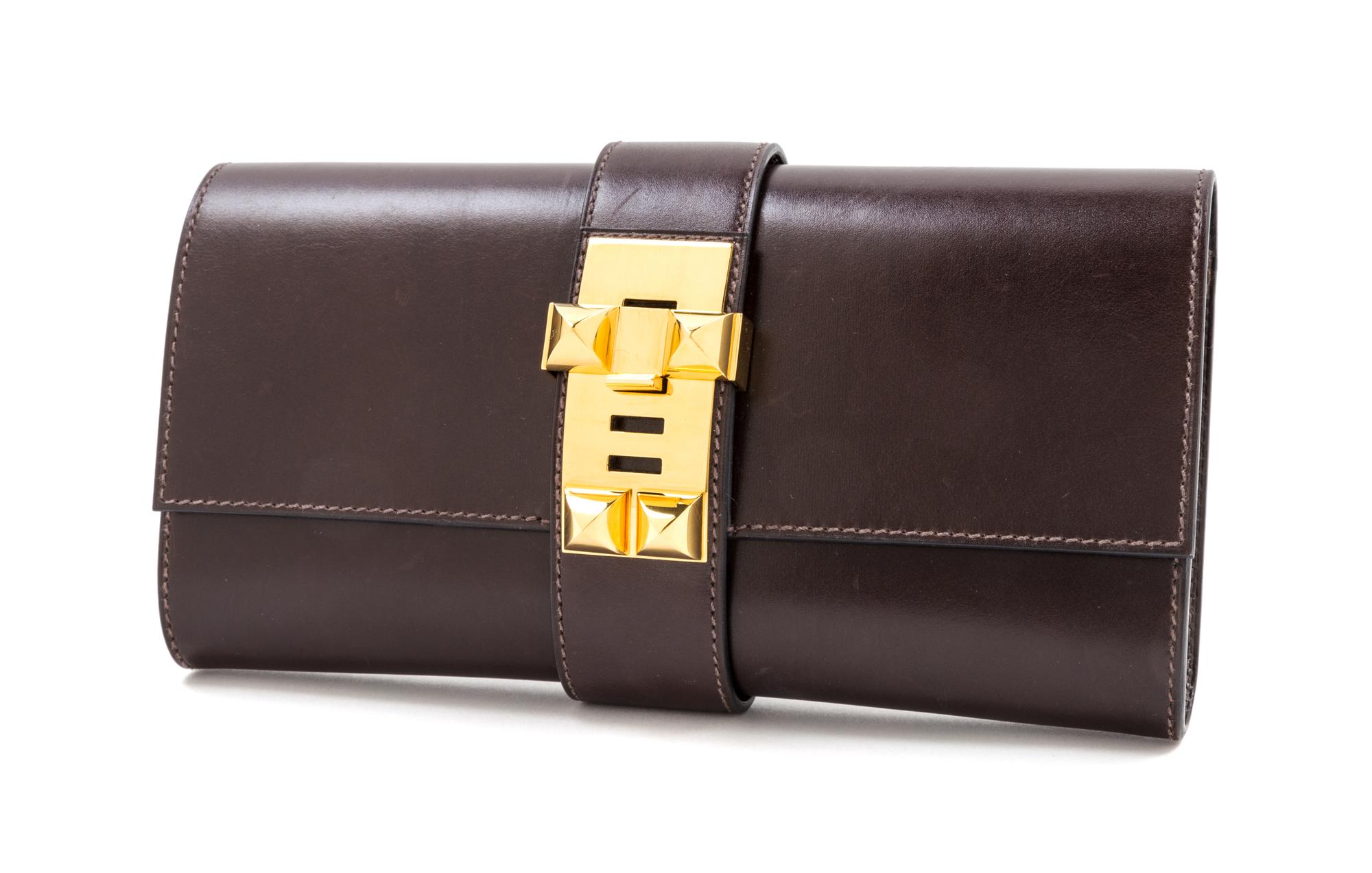 An Hermes 23cm Brown Box Calf Medor Clutch, 9" x 4.5" x 1.5".
