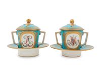 A Pair of Sèvres Style Porcelain Cups and Saucers
