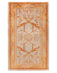 An Oushak Wool Rug