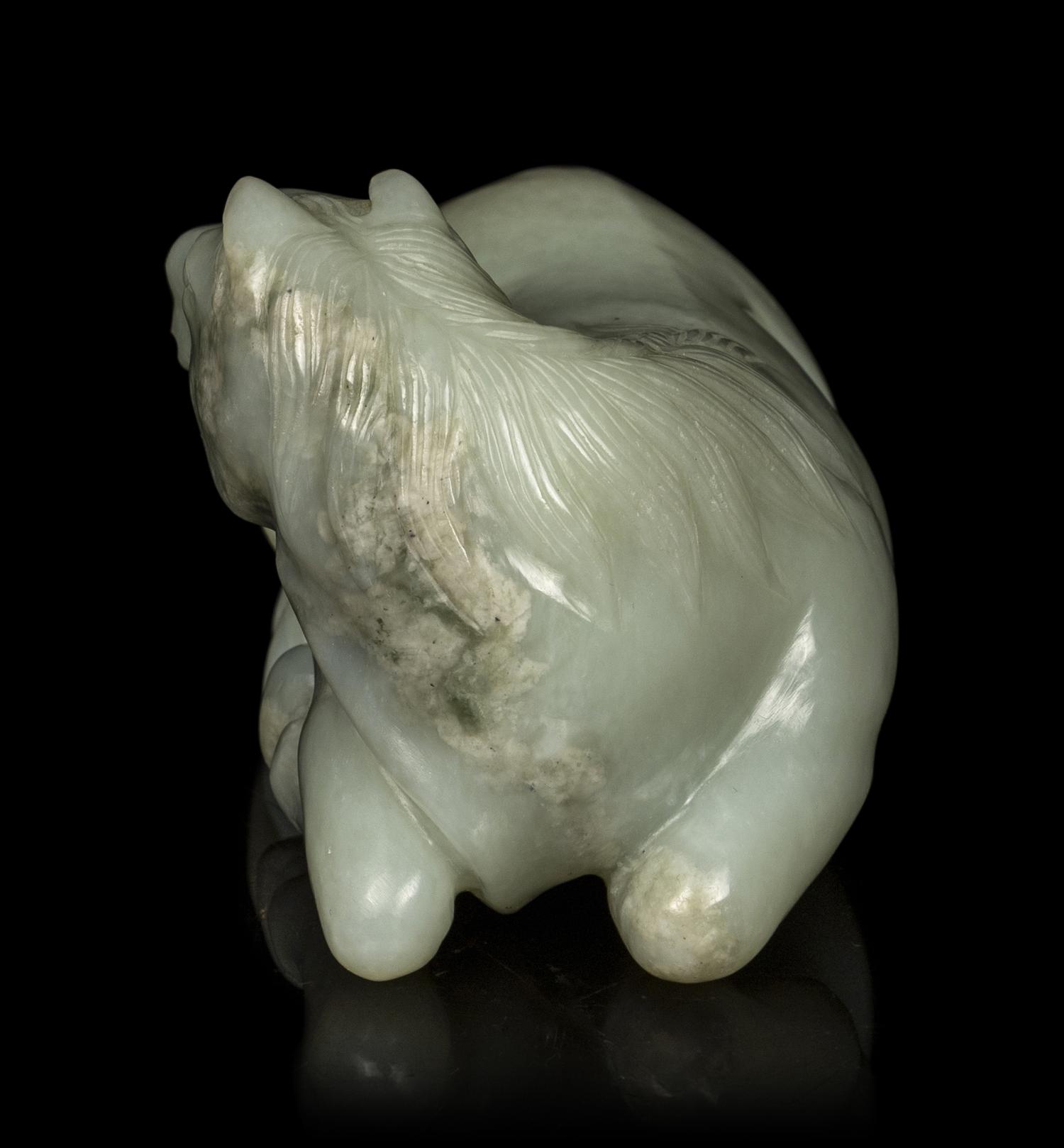 A Chinese Celadon Jade Horse