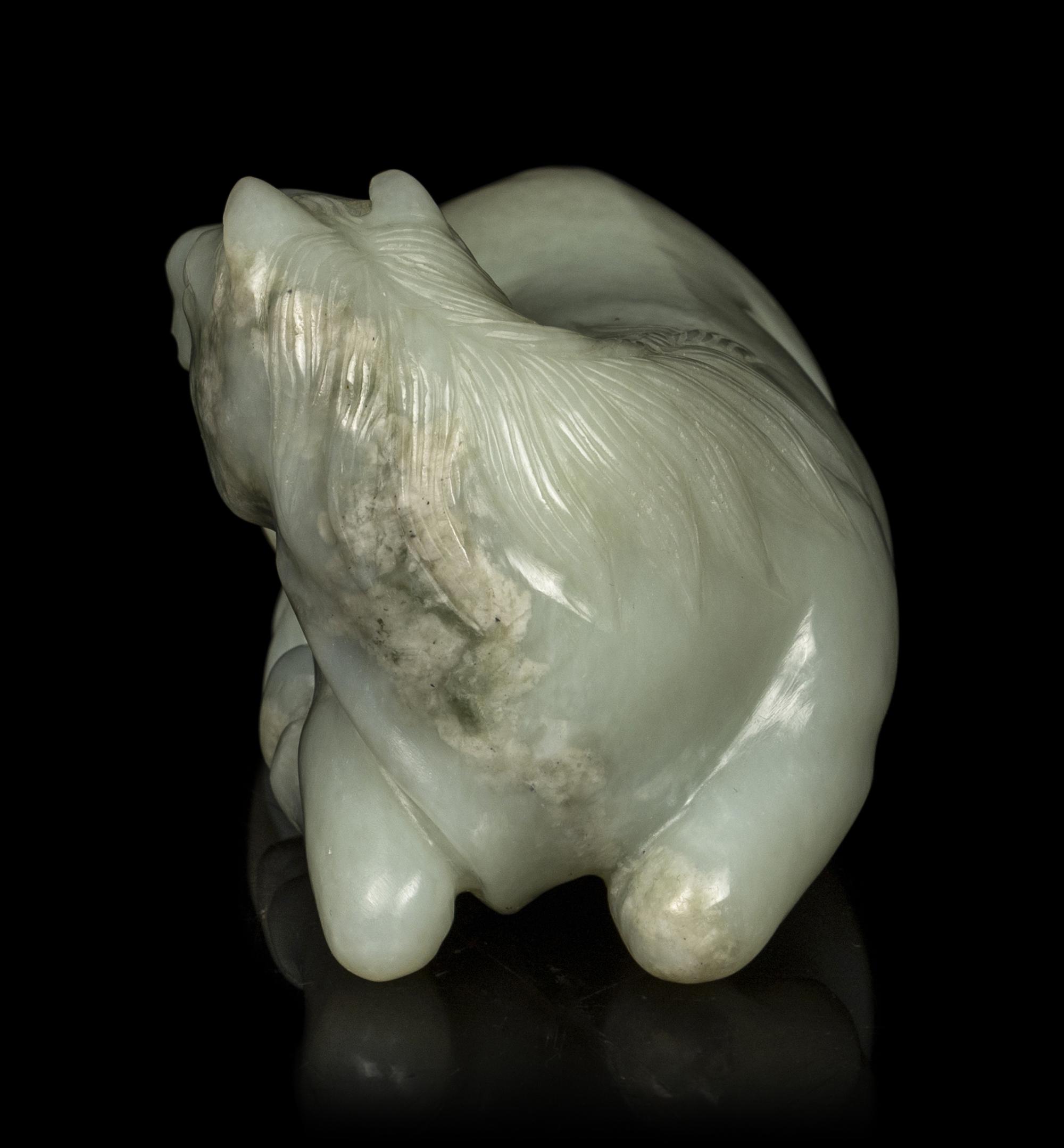 A Chinese Celadon Jade Horse