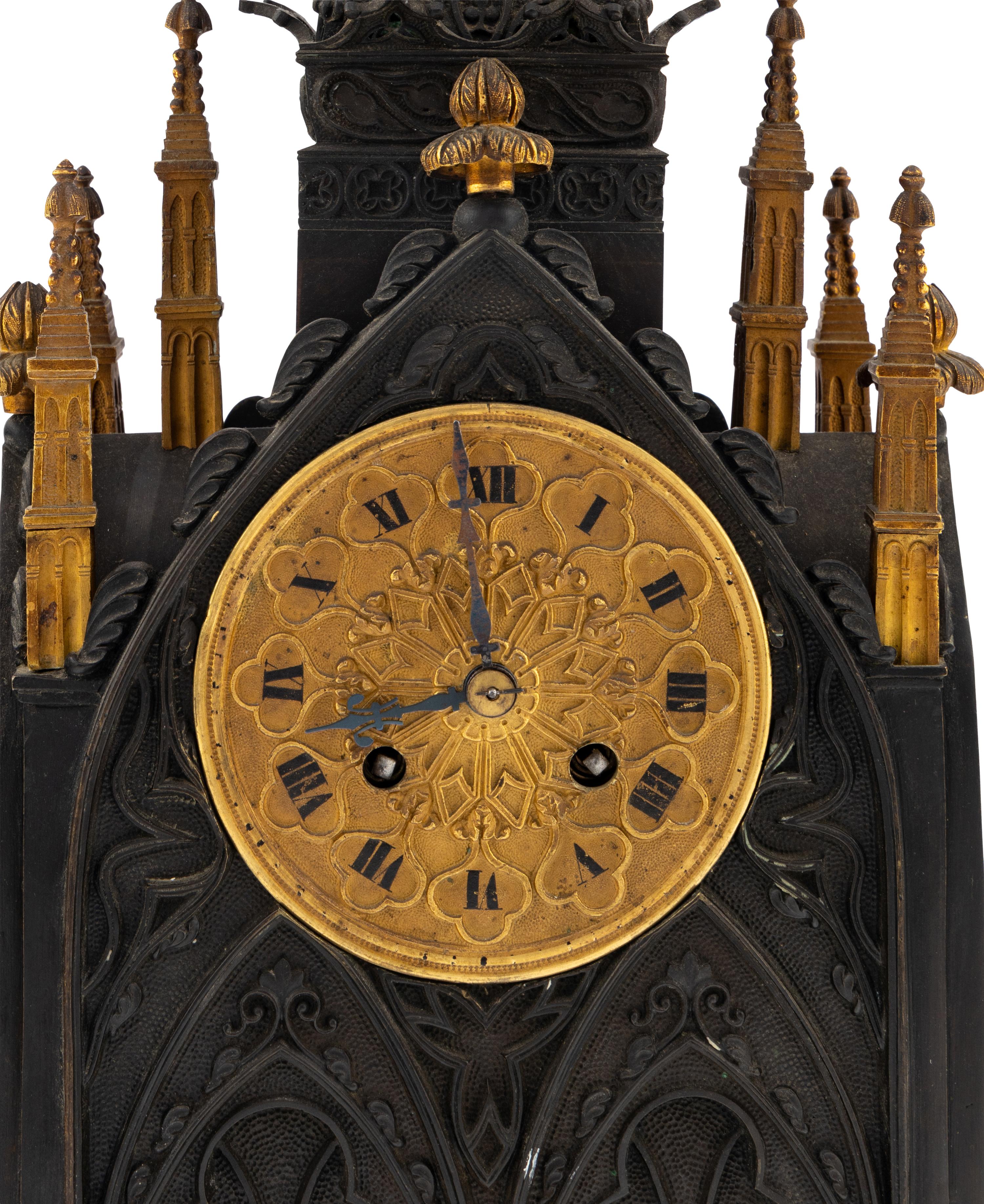 A French Patinated and Parcel Gilt Bronze Cathedral-Form Clock
