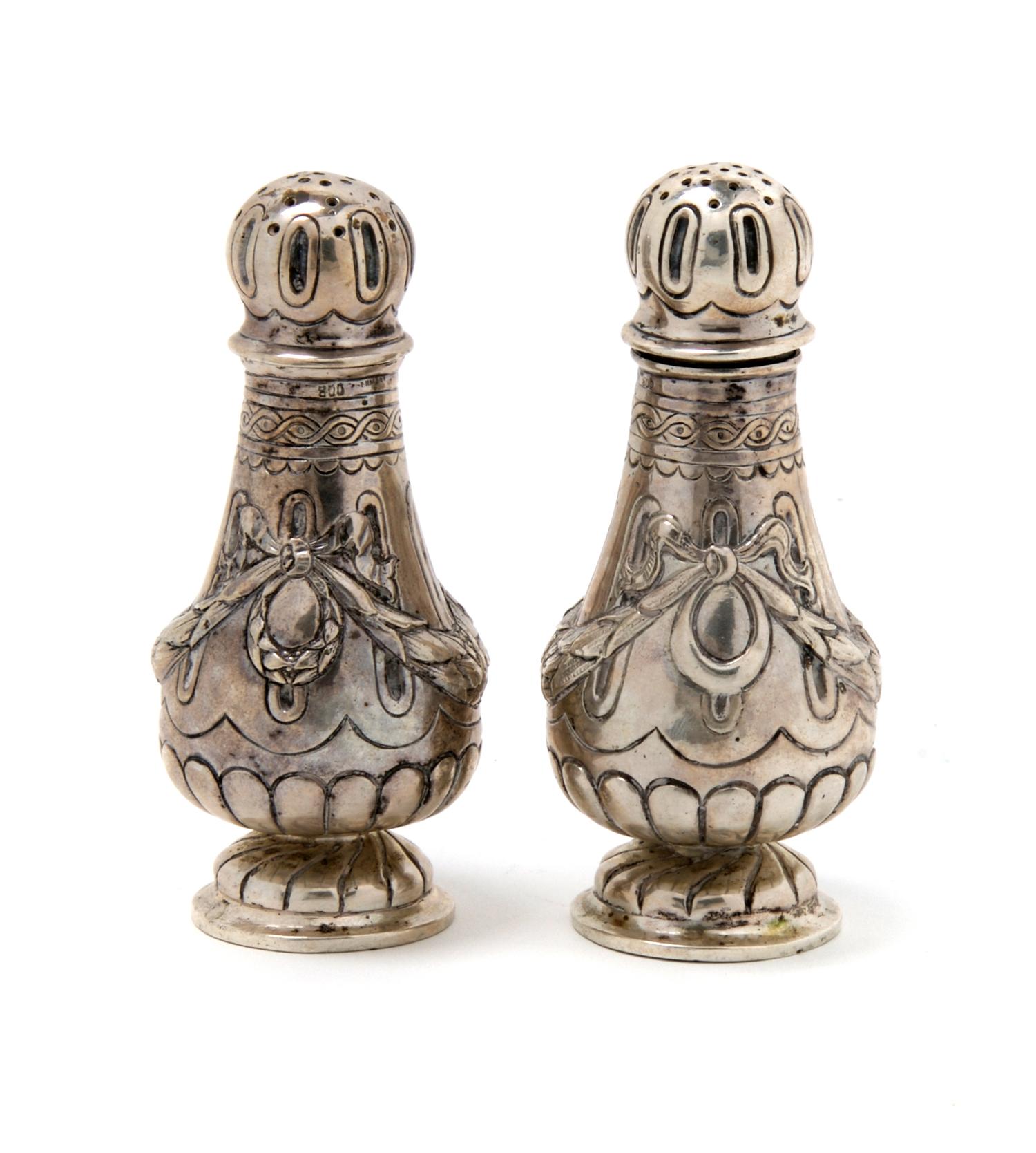 A Pair of German Silver Casters, Height 4 1/8 inches.