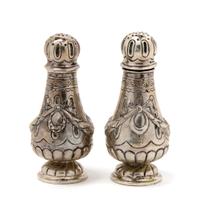 A Pair of German Silver Casters, Height 4 1/8 inches.