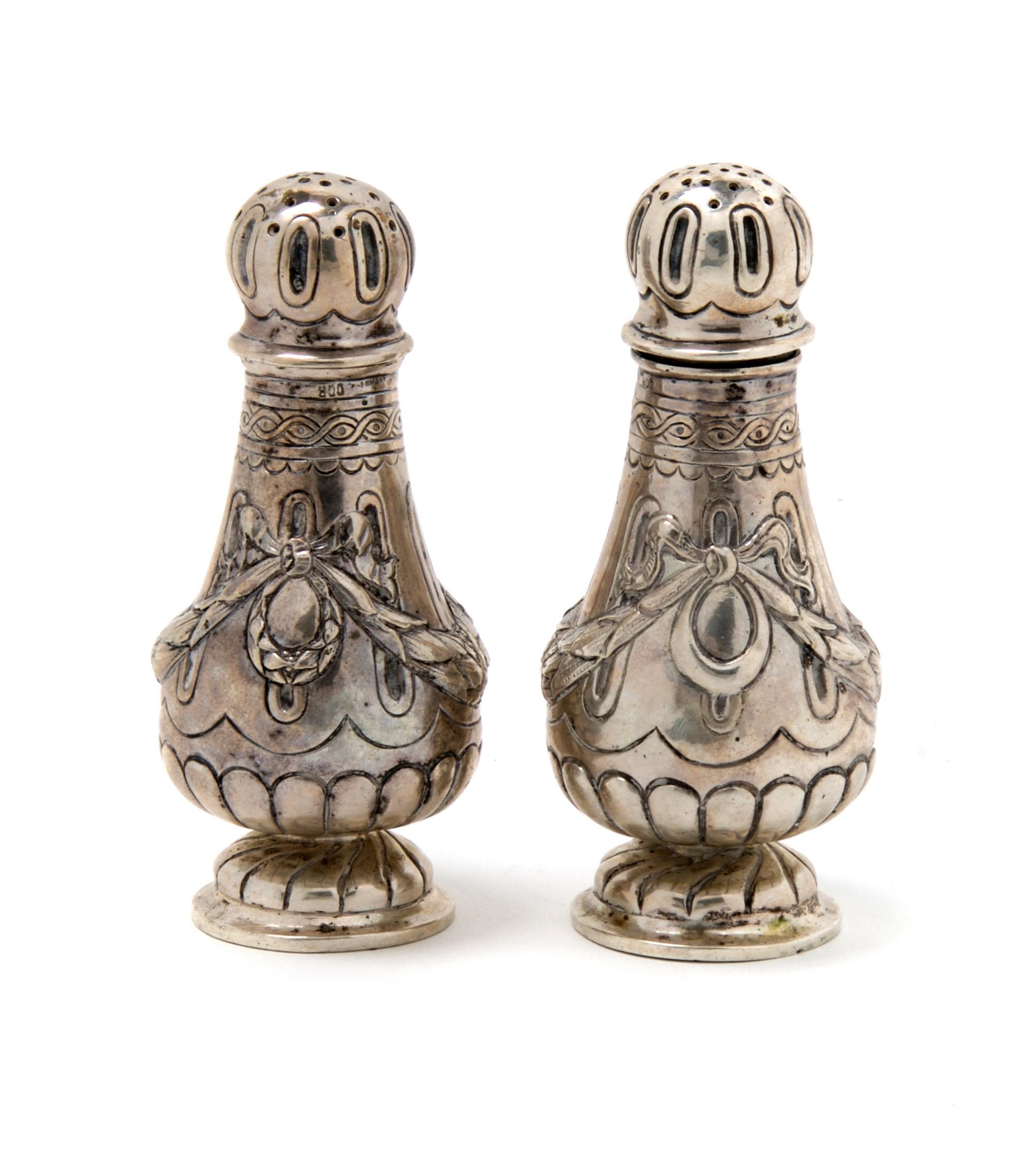 A Pair of German Silver Casters, Height 4 1/8 inches.