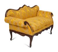 A Louis XV Provincial Carved Walnut Settee
