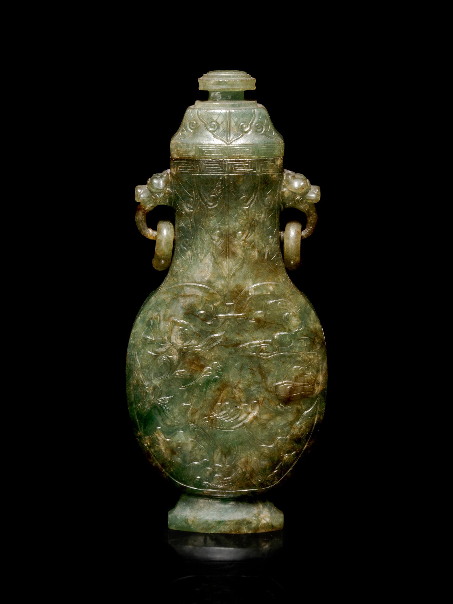 A Carved Spinach Green Jade Ring-Handled Vase and Cover