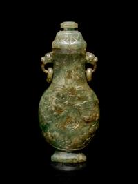 A Carved Spinach Green Jade Ring-Handled Vase and Cover