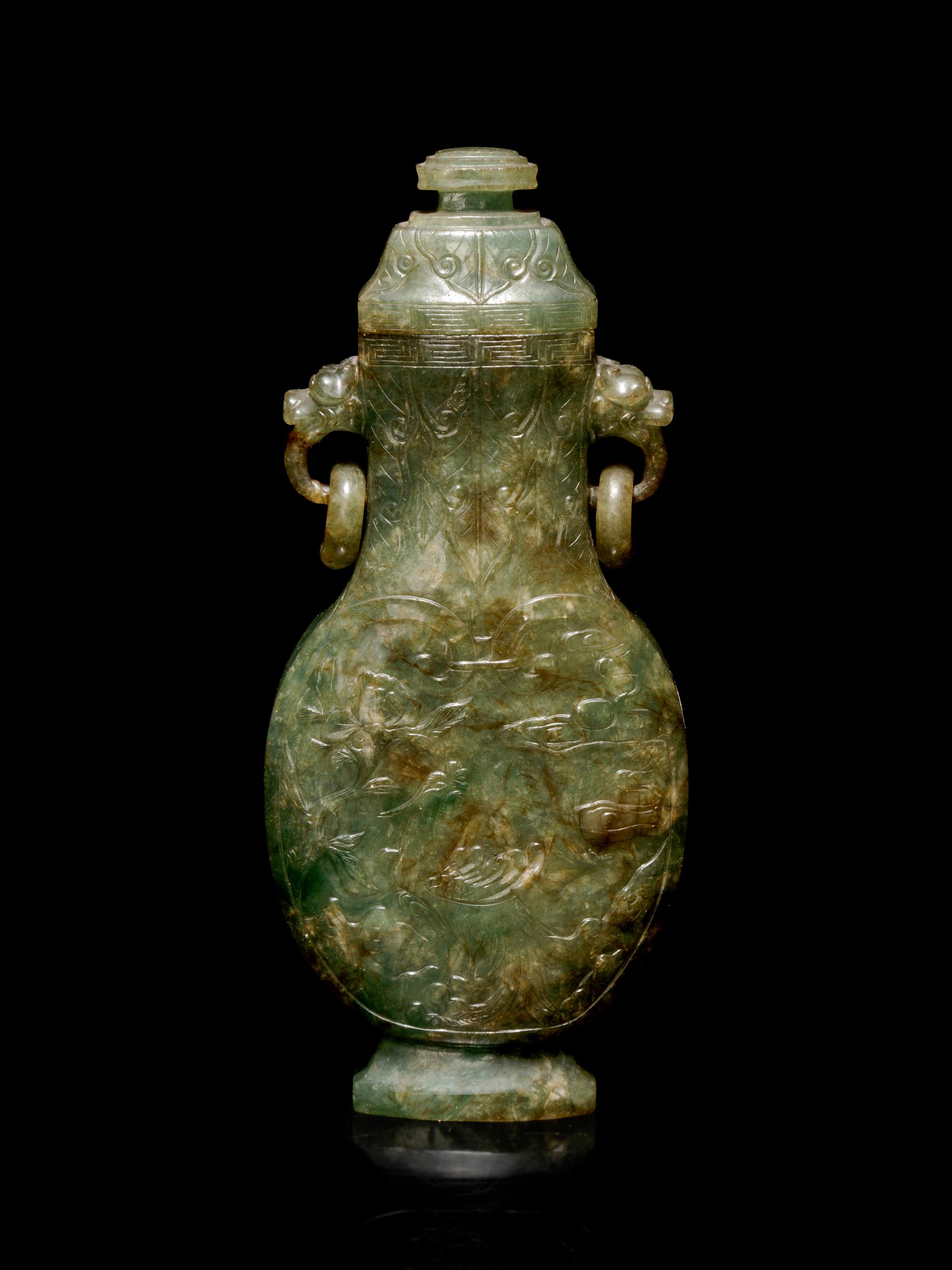 A Carved Spinach Green Jade Ring-Handled Vase and Cover
