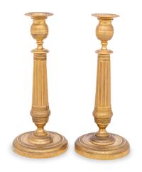 A Pair of Continental Gilt Metal Candlesticks