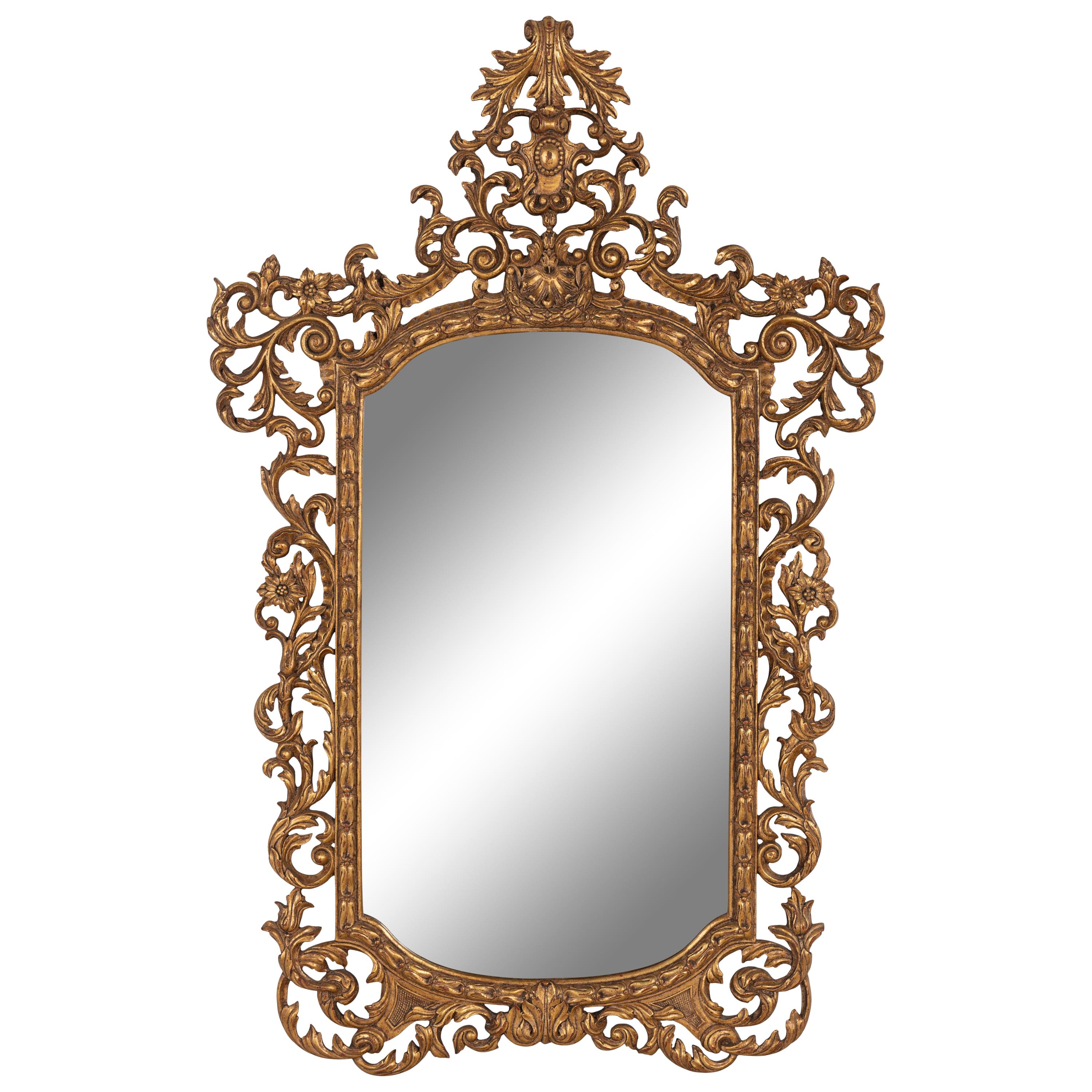 An Italian Rococo Style Giltwood Mirror