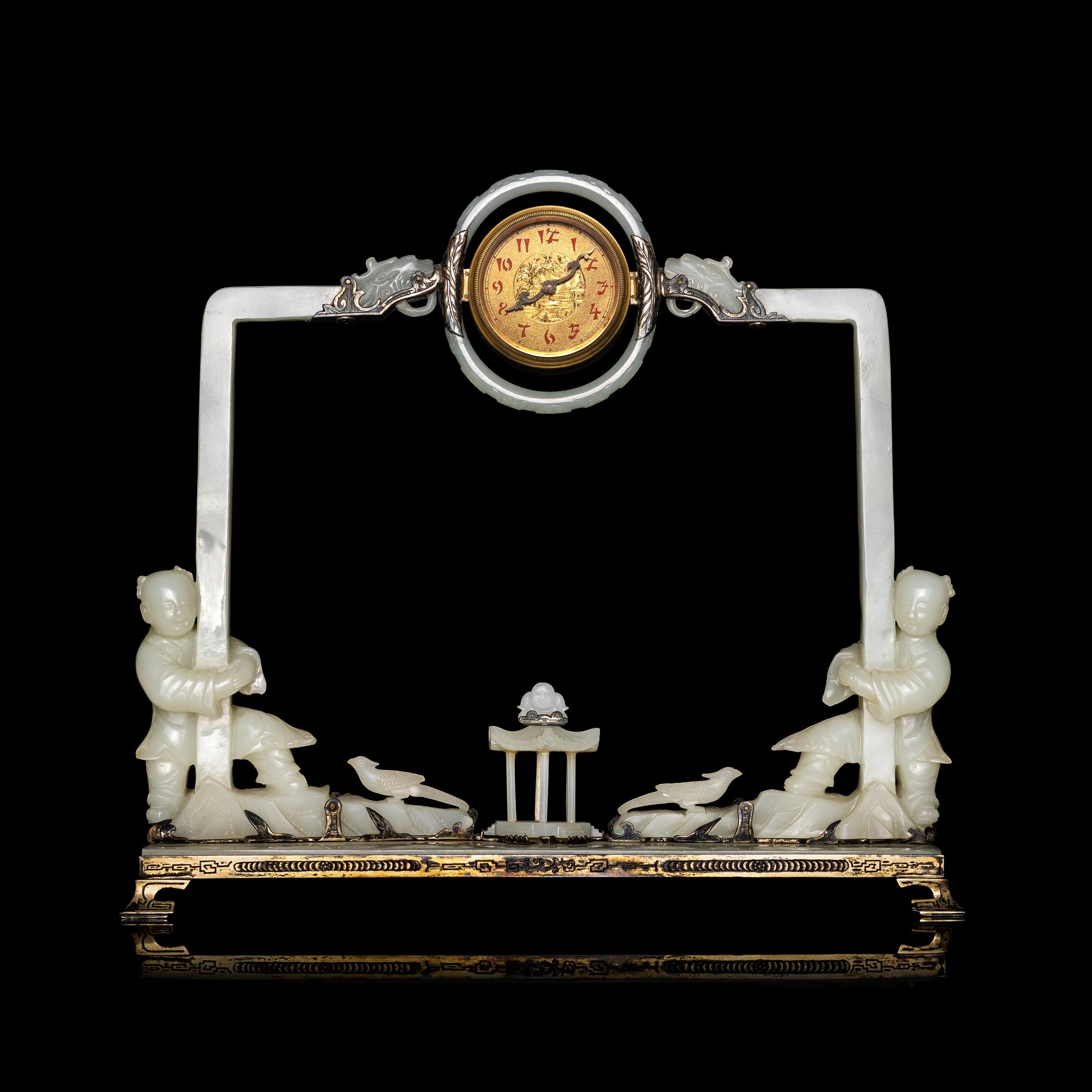 An Edward I. Farmer White Jade and Silver Mounted Chinoiserie Desk Clock, Circa 1930 Edward I. Farmer約1930年製中國風白玉童子座鐘