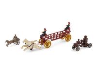 A Group of Three Horse Drawn Cast Iron Toys