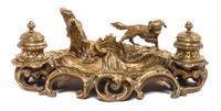 A Continental Gilt Brass Encrier Width 12 1/4 inches. — FIRST HALF 20TH CENTURY