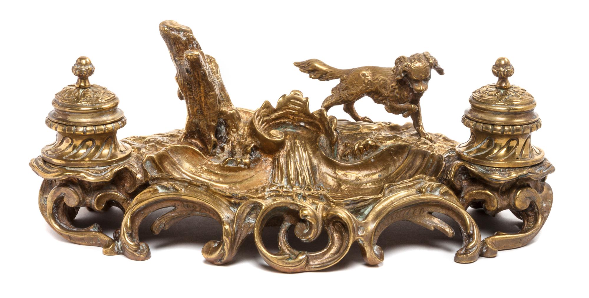 A Continental Gilt Brass Encrier Width 12 1/4 inches. — FIRST HALF 20TH CENTURY