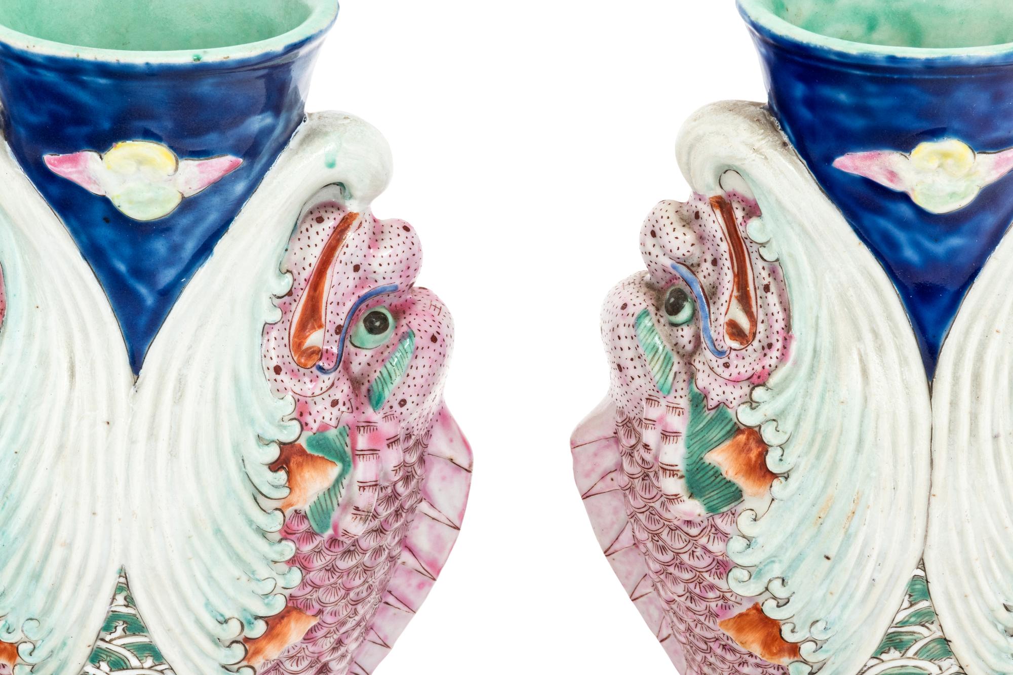 A Pair of Chinese Famille Rose 'Capricorns' Porcelain Vases