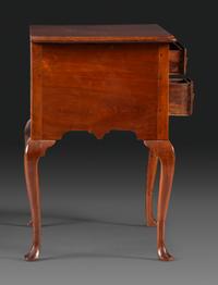 A Queen Anne Carved and Figured Walnut Dressing Table