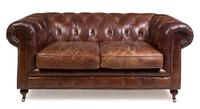 A Leather Upholstered Chesterfield Sofa Height 31 x width 70 x depth 38 1/2 inches. — 20TH CENTURY