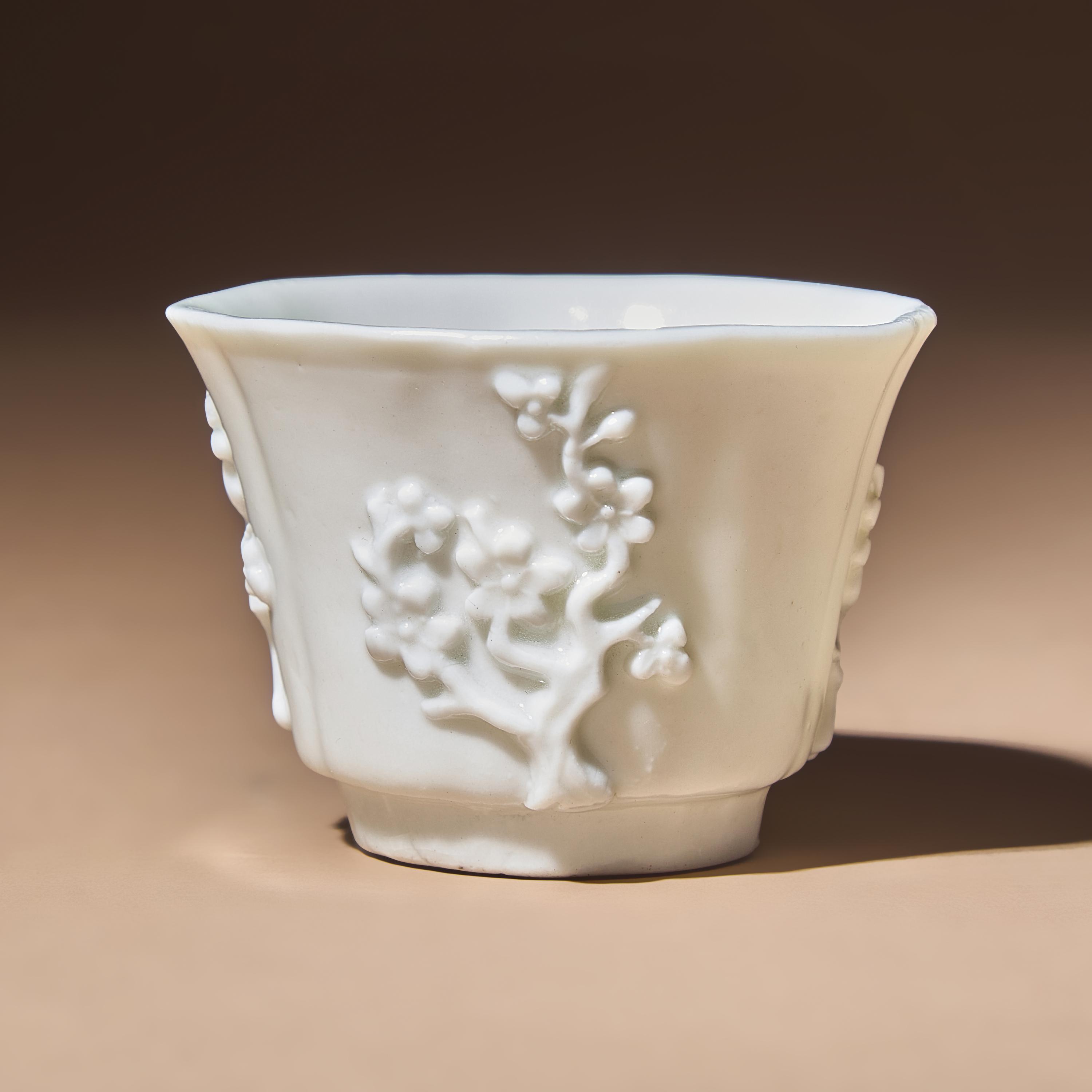 A Chinese Blanc-de-Chine Porcelain Cup, 17th Century — 明末清初 德化白瓷貼塑梅紋花口杯