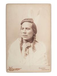 [NATIVE AMERICANS]. HAYNES, Frank Jay (1853-1921), photographer. Cabinet card of Curley, George Custer's scout. Fargo, Dakota Territory, ca 1880s