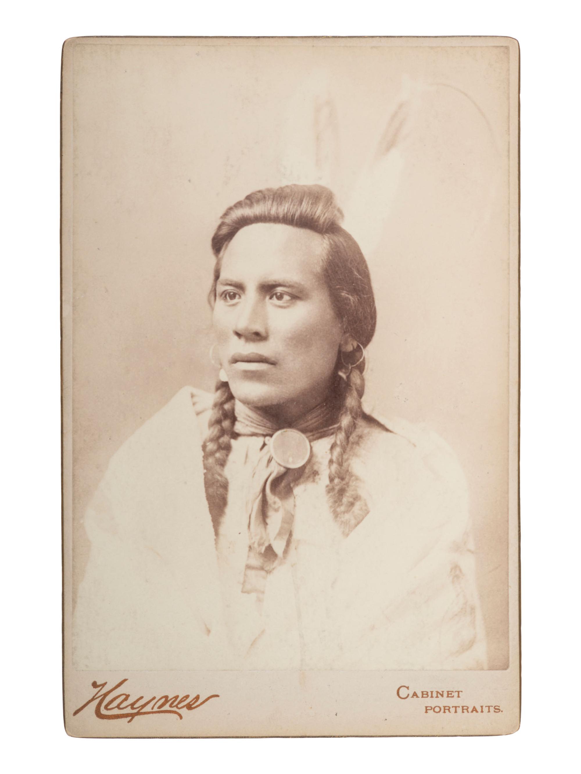 [NATIVE AMERICANS]. HAYNES, Frank Jay (1853-1921), photographer. Cabinet card of Curley, George Custer's scout. Fargo, Dakota Territory, ca 1880s