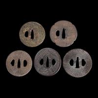 Group of fifteen assorted Japanese tsuba Meiji period and earlier
