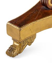 A Regency Parcel Gilt Mahogany Center Table
