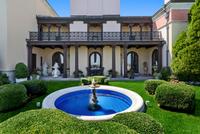 A Pair of French Painted and Parcel Gilt Trumeau Mirrors