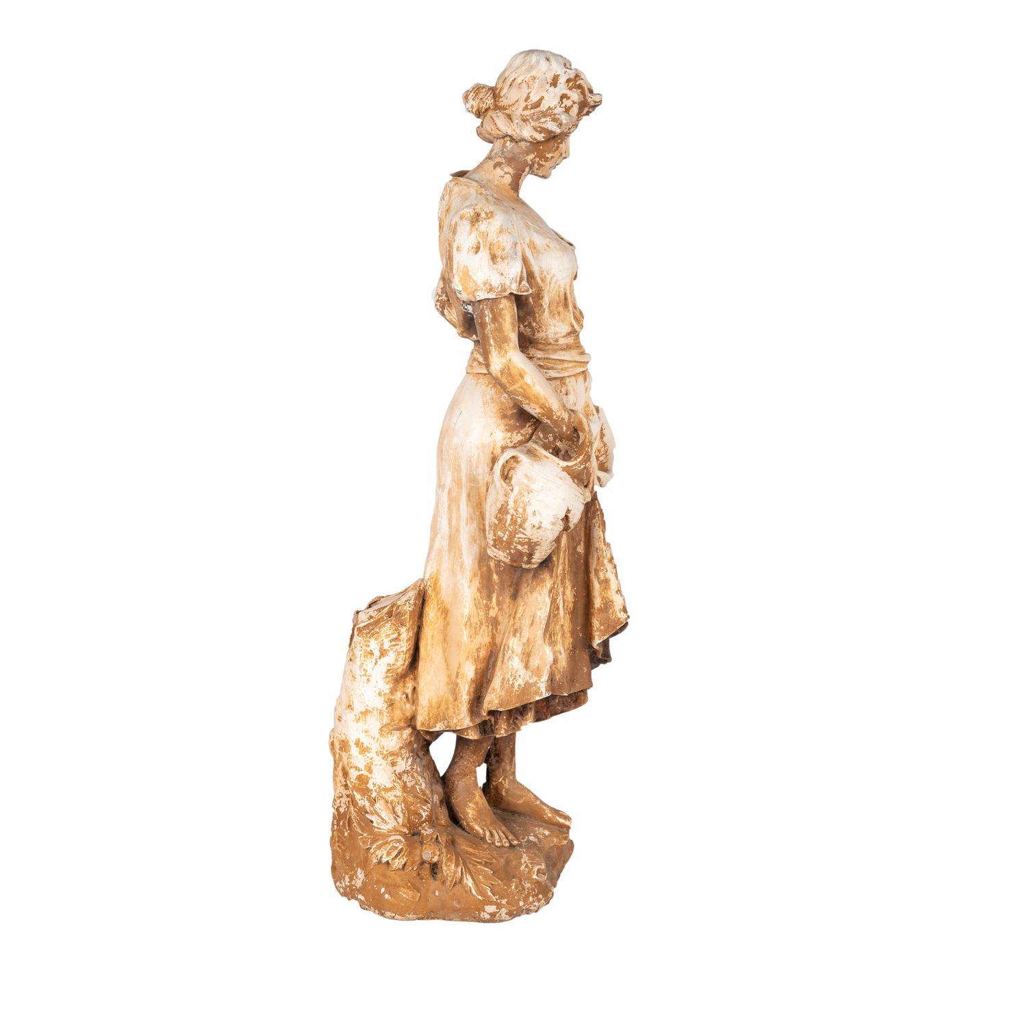A French Terra Cotta Figure of a Farm Girl
