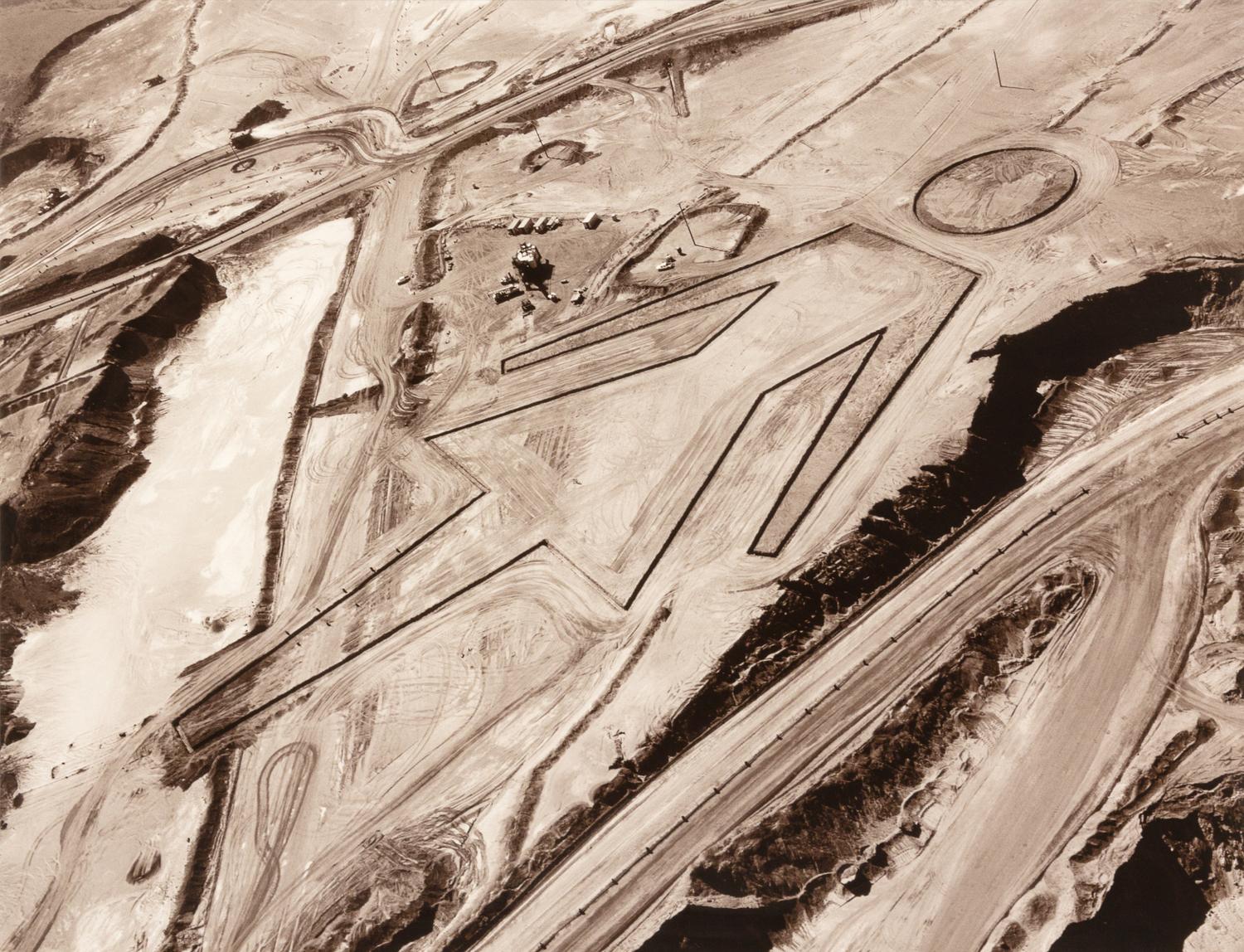 Female (Joao Pereira, iron mine)