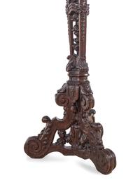 A Pair of Louis XIV Style Carved Oak Torchères