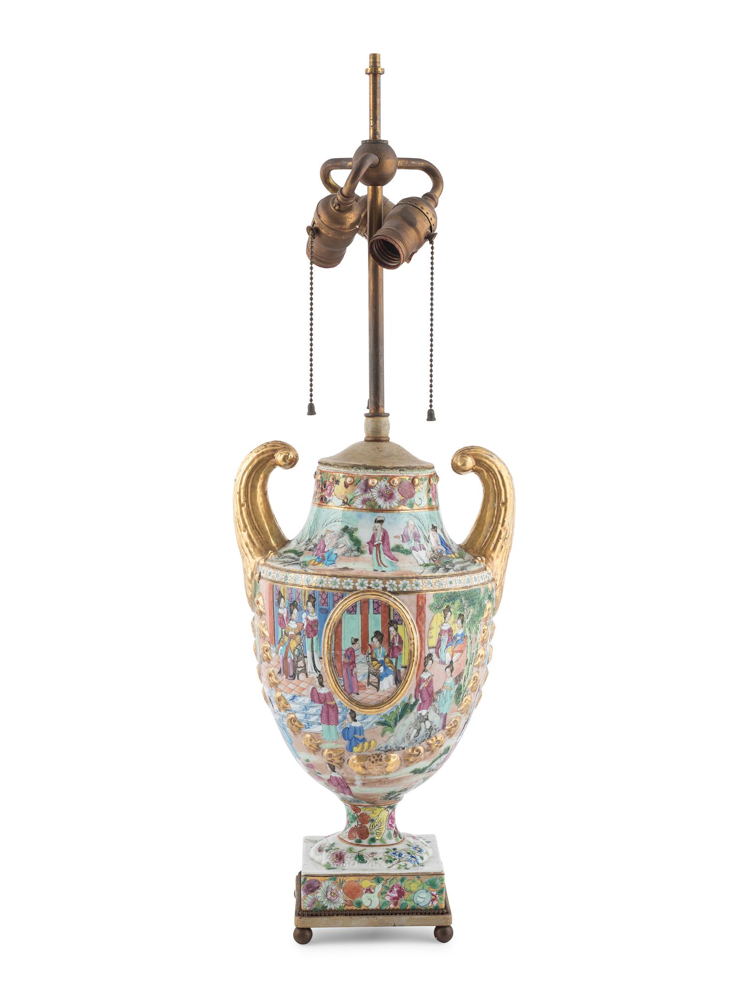 A Chinese Export Parcel Gilt Decorated Famille Rose Porcelain Pistol-Handled Urn