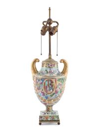 A Chinese Export Parcel Gilt Decorated Famille Rose Porcelain Pistol-Handled Urn