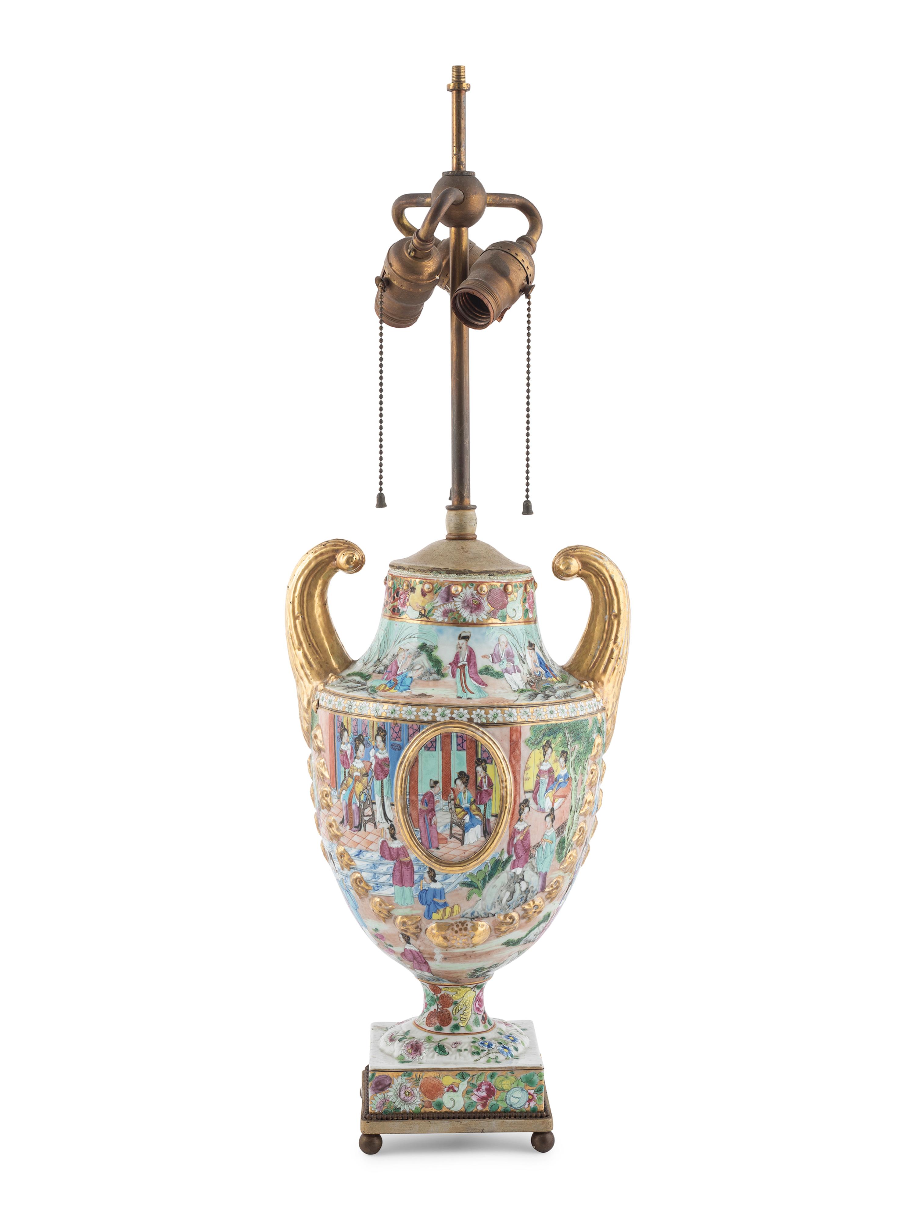 A Chinese Export Parcel Gilt Decorated Famille Rose Porcelain Pistol-Handled Urn