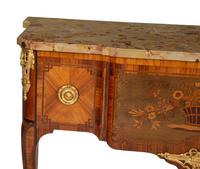 A Louis XV Style Gilt Bronze Mounted Kingwood and Marquetry Marble-Top Commode